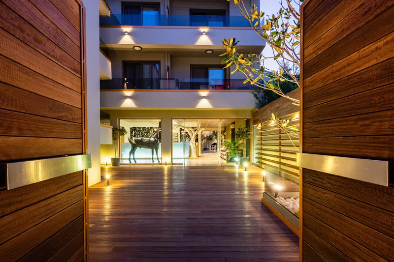 The timber entrance deck, with the hotel’s balconies above